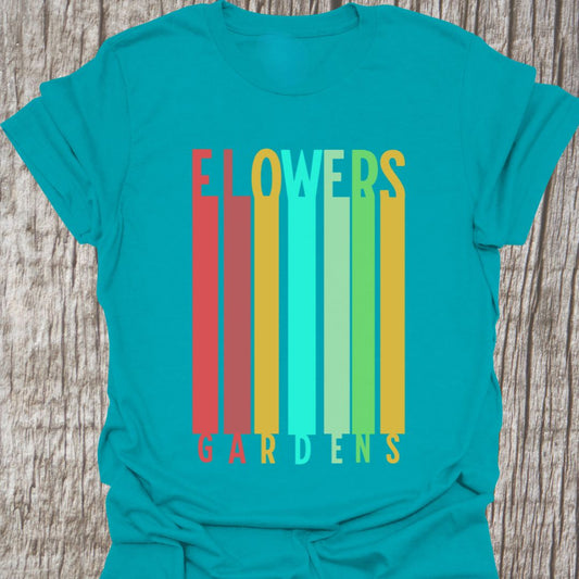 Color blocks tropical blue t-shirt with text saying garden and flower in matching colors.