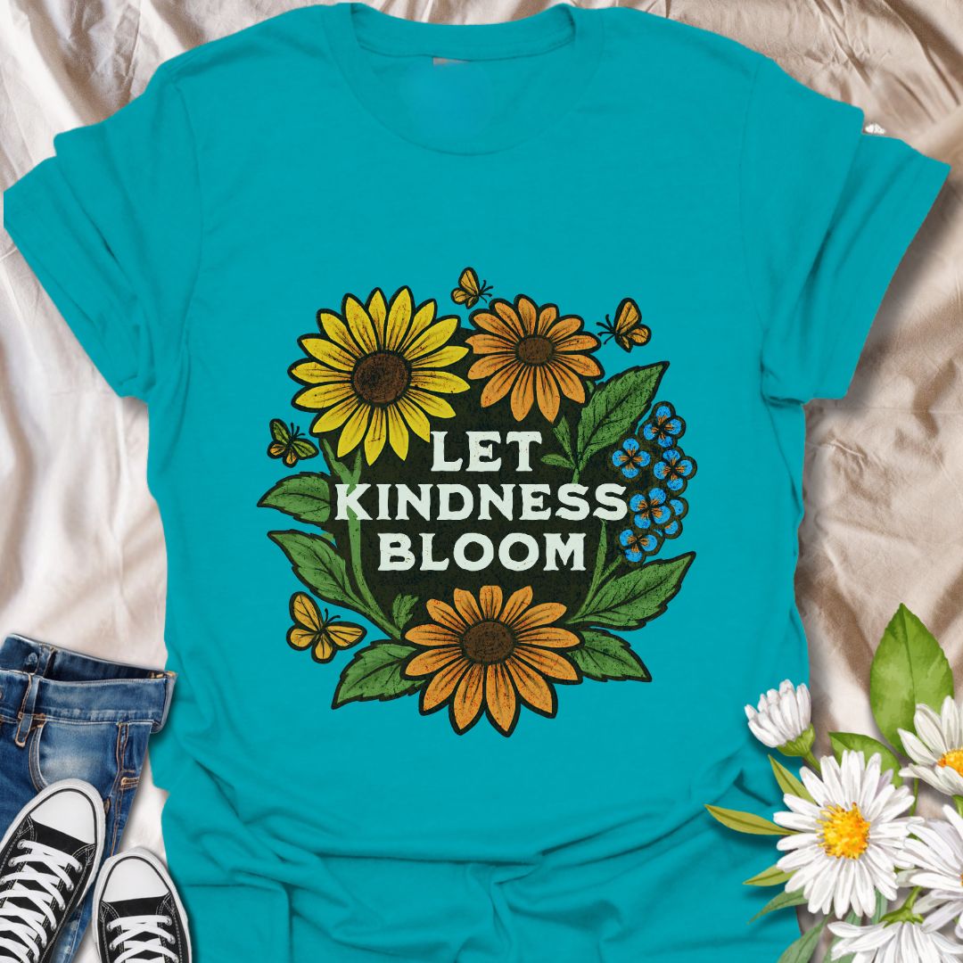 Bright Let Kindness Bloom t-shirt with bold sunflowers, daisies, butterflies, and uplifting quote. Perfect gift for flower lovers, gardeners, teachers, and kindness advocates. Vibrant nature-inspired graphic tee for spreading positivity and sunshine