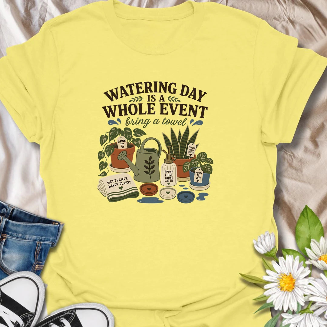 Celebrate the weekly houseplant ritual with this “Watering Day Is a Whole Event” T-shirt. Featuring thirsty plants, watering tools, saucers, and the reminder to bring a towel, it perfectly captures the organized chaos of plant care. A funny gift for indoor gardeners with an extensive watering routine.