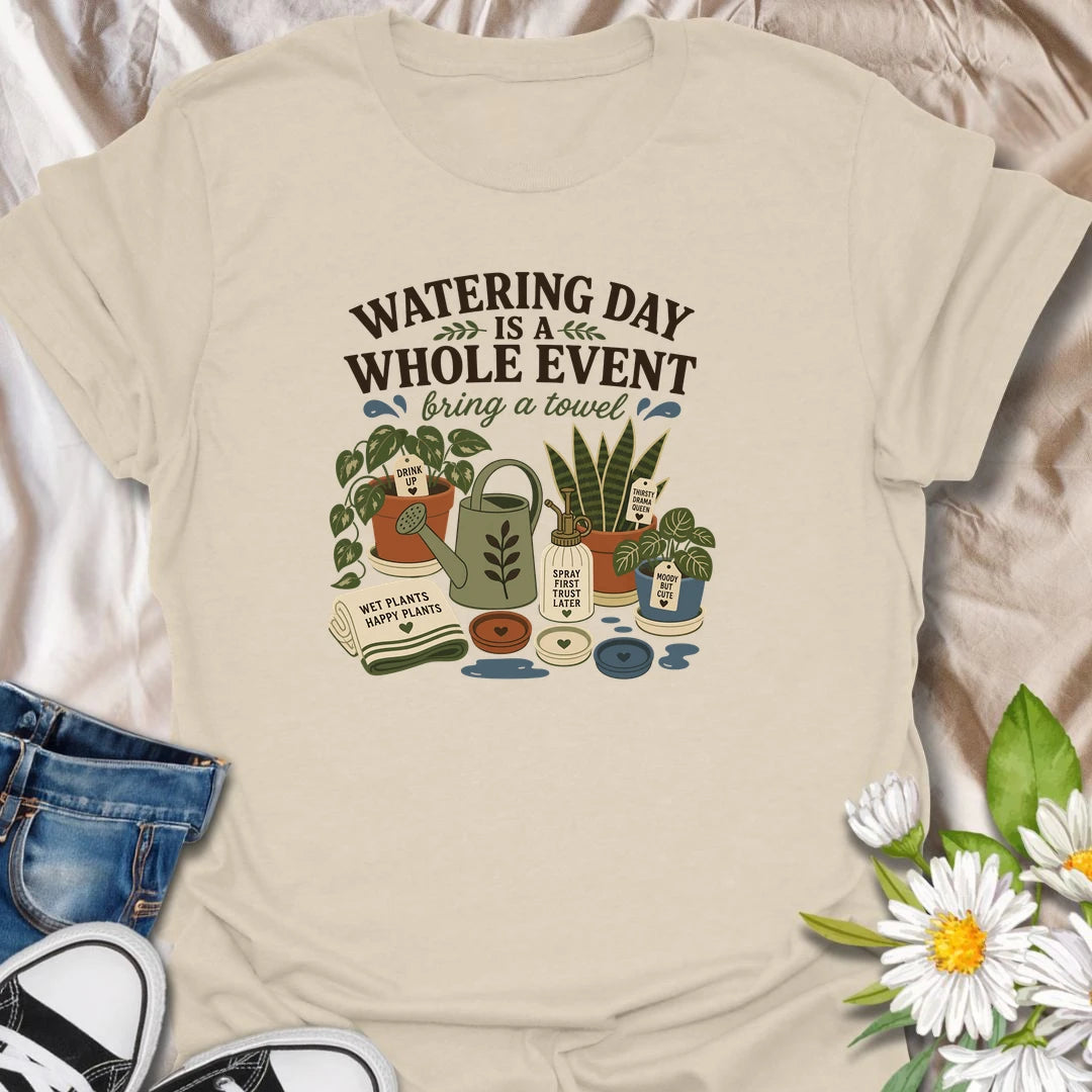 Celebrate the weekly houseplant ritual with this “Watering Day Is a Whole Event” T-shirt. Featuring thirsty plants, watering tools, saucers, and the reminder to bring a towel, it perfectly captures the organized chaos of plant care. A funny gift for indoor gardeners with an extensive watering routine.