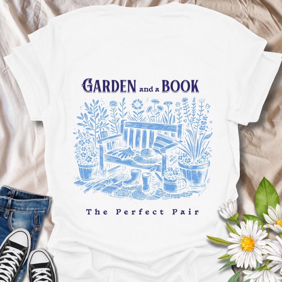 Charming “Garden and a Book - The Perfect Pair” t-shirt featuring a vintage-style garden bench, flowers, potted plants, gloves, boots, and a sun hat. Ideal gift for bookworms, gardeners, plant lovers, and anyone who enjoys relaxing outdoors with a good read.