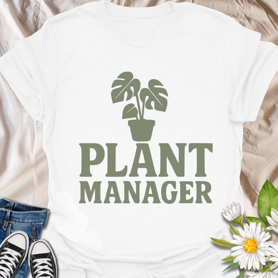 Show your houseplant pride with this humorous "Plant Manager" graphic t-shirt featuring a bold monstera illustration. Perfect for plant parents, gardening enthusiasts, and anyone who takes their indoor jungle seriously—with a sense of humor.