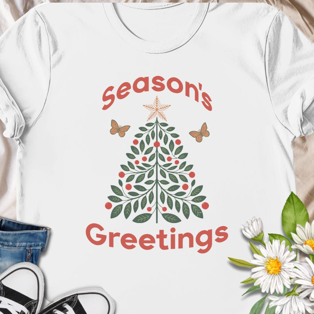 Spread festive cheer with this charming “Season’s Greetings” t-shirt featuring a leafy Christmas tree and butterflies. A unique and nature-inspired holiday tee perfect for garden lovers and anyone who celebrates the season in style.