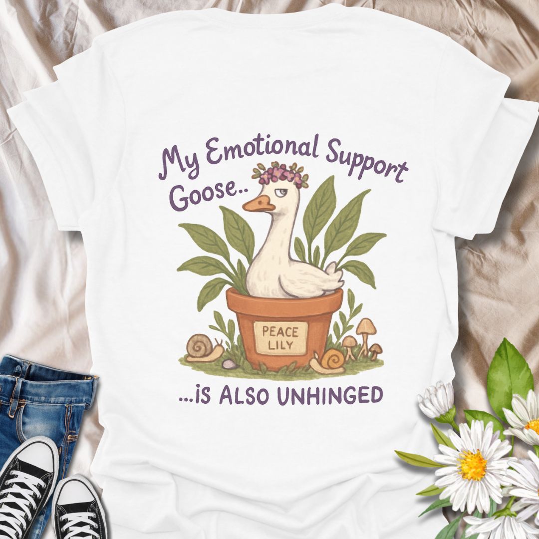 Hilarious and quirky t-shirt featuring a peace lily plant pot and an unhinged “emotional support goose.” This fun design is perfect for plant lovers, mental health warriors, and anyone with a wild sense of humor. A unique gift for gardeners and goose enthusiasts alike!