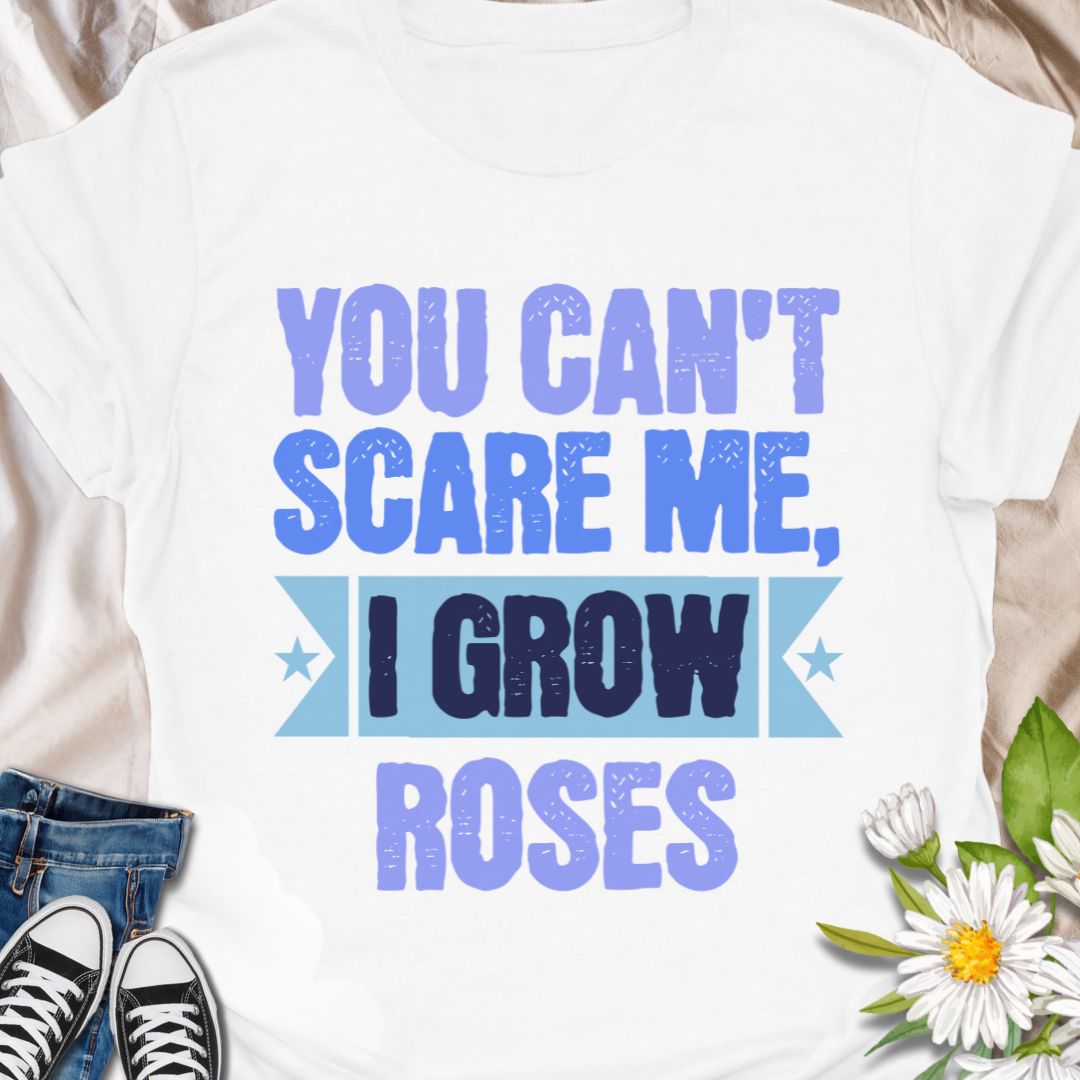 Show off your fearless green thumb with this bold "You Can't Scare Me, I Grow Roses" t-shirt. Designed for confident gardeners and rose enthusiasts who know the thorny truth of growing beauty. A perfect gift for plant lovers who aren’t afraid of a few pricks!