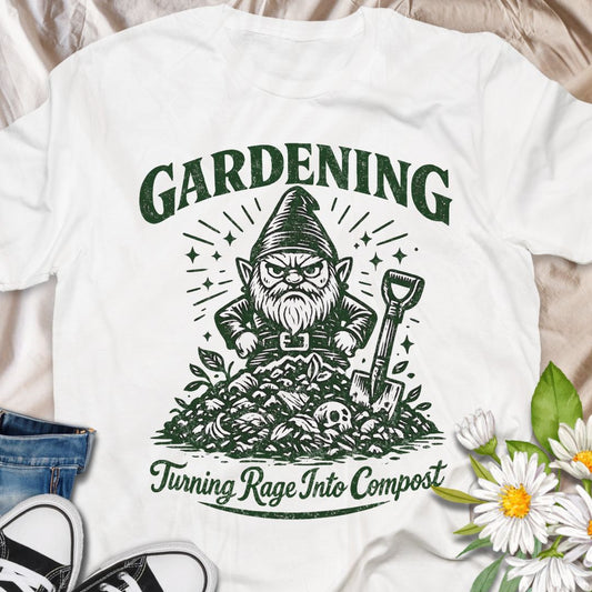 Channel your stress into soil with this “Gardening – Turning Rage Into Compost” t-shirt featuring a grumpy garden gnome standing over a compost pile. A perfect funny gift for gardeners, allotment lovers, and plant parents who use weeding and digging as their favorite form of therapy.