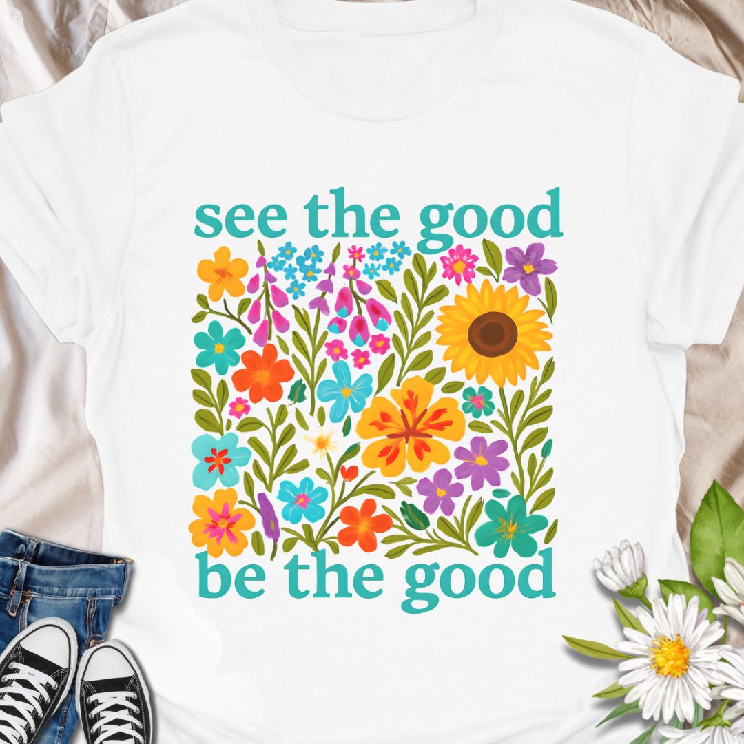 Brighten your day and your outfit with this vibrant floral t-shirt featuring the inspiring message: "See the good, be the good." Perfect for garden lovers, positivity seekers, and anyone who believes in spreading kindness. A cheerful and meaningful gift for plant moms, flower fans, and happy souls alike.