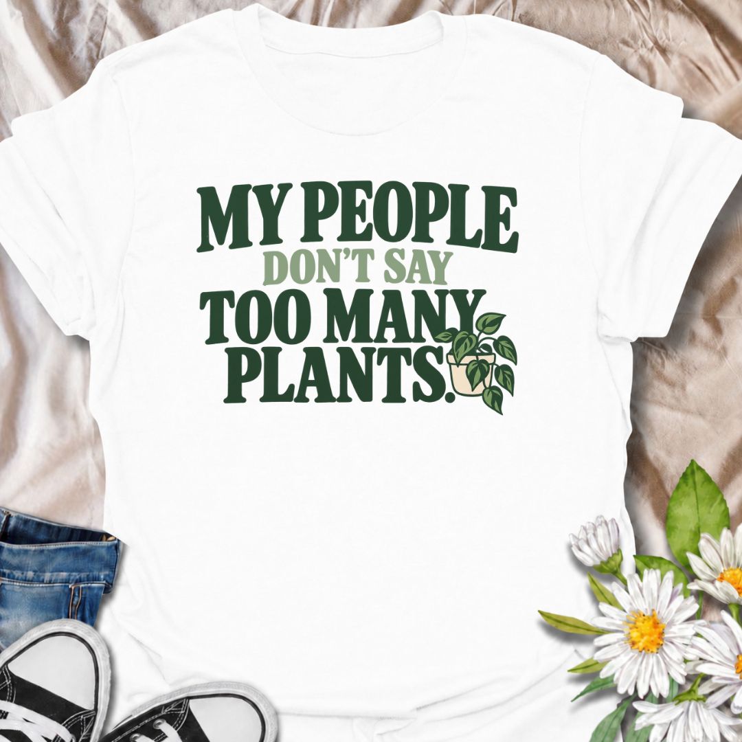 A funny plant T-shirt for anyone who knows the right people never say you have too many plants. The phrase “My People Don’t Say Too Many Plants” turns plant collecting into a little badge of belonging for houseplant lovers and indoor gardeners. Featuring bold retro typography with a simple trailing plant accent, the design stays clean, readable, and easy to wear. It makes a great gift for plant parents, nursery regulars, and anyone whose friends fully support one more plant purchase. Perfect for plant swaps