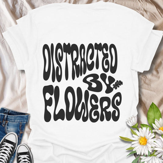 Fun “Distracted By Flowers” t-shirt with bold retro font, perfect for plant lovers, wildflower enthusiasts, and anyone who gets happily sidetracked by nature’s beauty. Great botanical gift for gardeners, florists, and flower fans with a sense of humor.