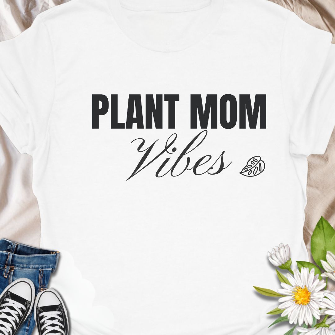 Celebrate your nurturing nature with this adorable “Plant Mom Vibes” t-shirt. Whether you’re tending to your houseplants or just vibing with your leafy family, this tee is perfect for proud plant moms and botanical beauties. Makes a thoughtful gift for birthdays, Mother's Day, or plant-obsessed friends.