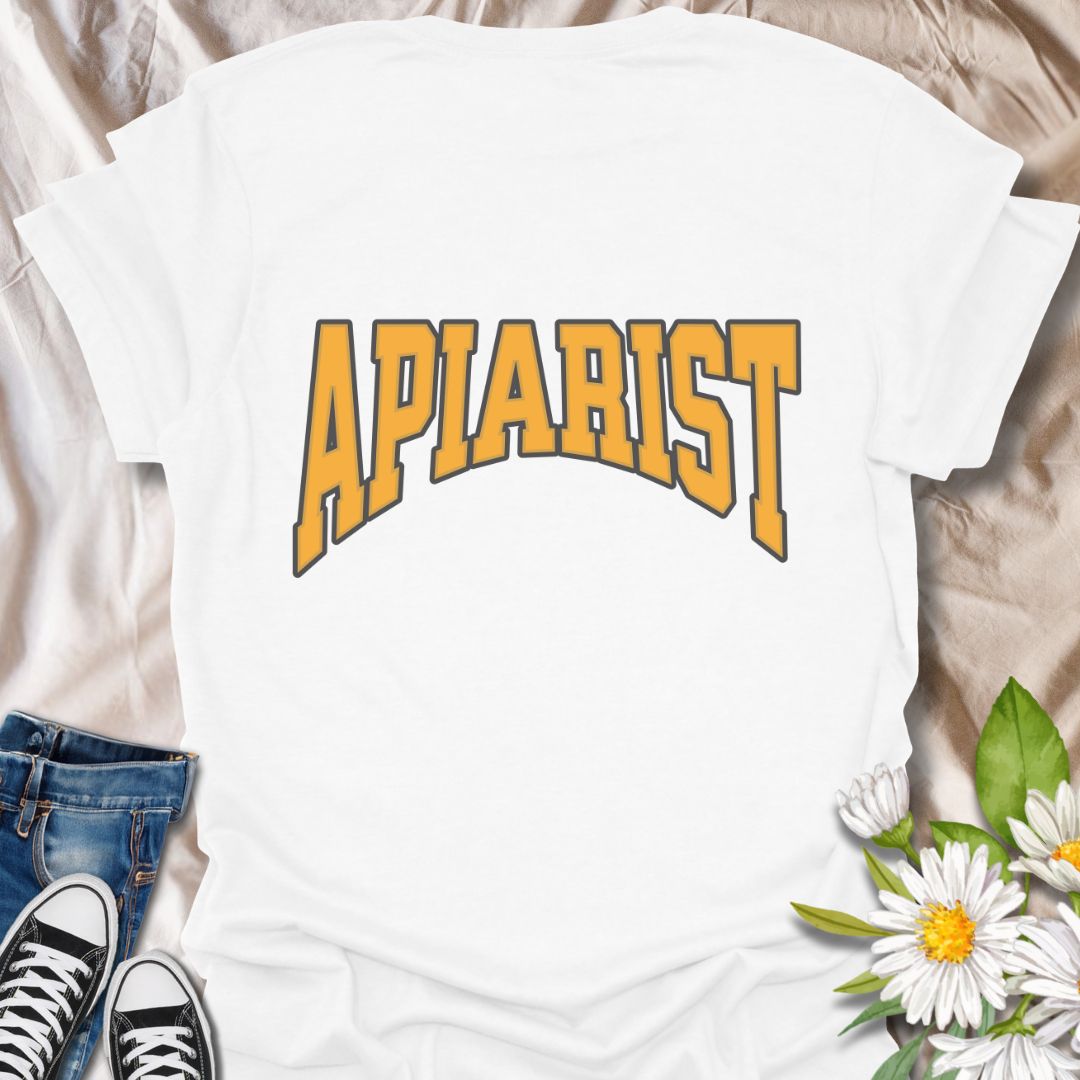 Simple bold "Apiarist" t-shirt with collegiate-style yellow lettering on black. Perfect for professional beekeepers, hobbyist beekeepers, honey producers, and bee conservation advocates. Great gift for anyone passionate about apiculture, bee science, or protecting pollinators.