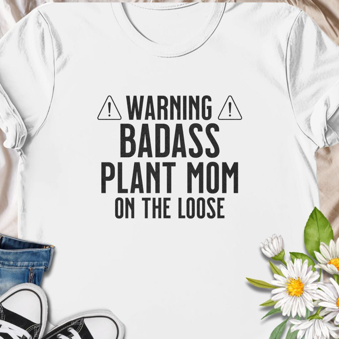 Make way for the ultimate green queen! This "Warning: Badass Plant Mom on the Loose" tee is a fun, bold design perfect for confident plant lovers and indoor jungle owners. A great gift for fierce plant moms with serious leaf pride.