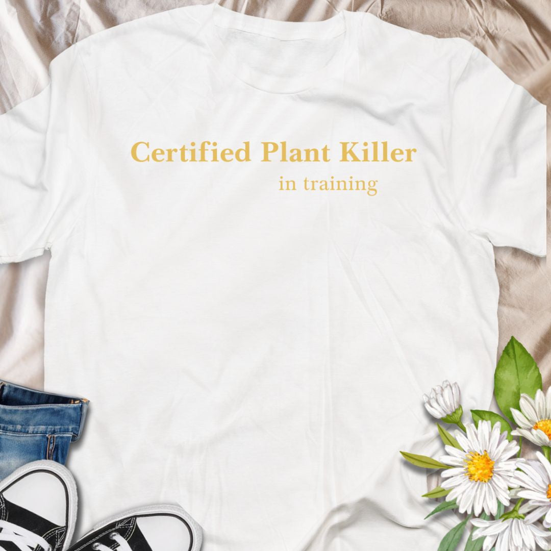 Own your not-so-green thumb with this “Certified Plant Killer in Training” t-shirt. A playful plant lover tee that makes a perfect funny gift for new plant parents still learning how to keep their houseplants alive.