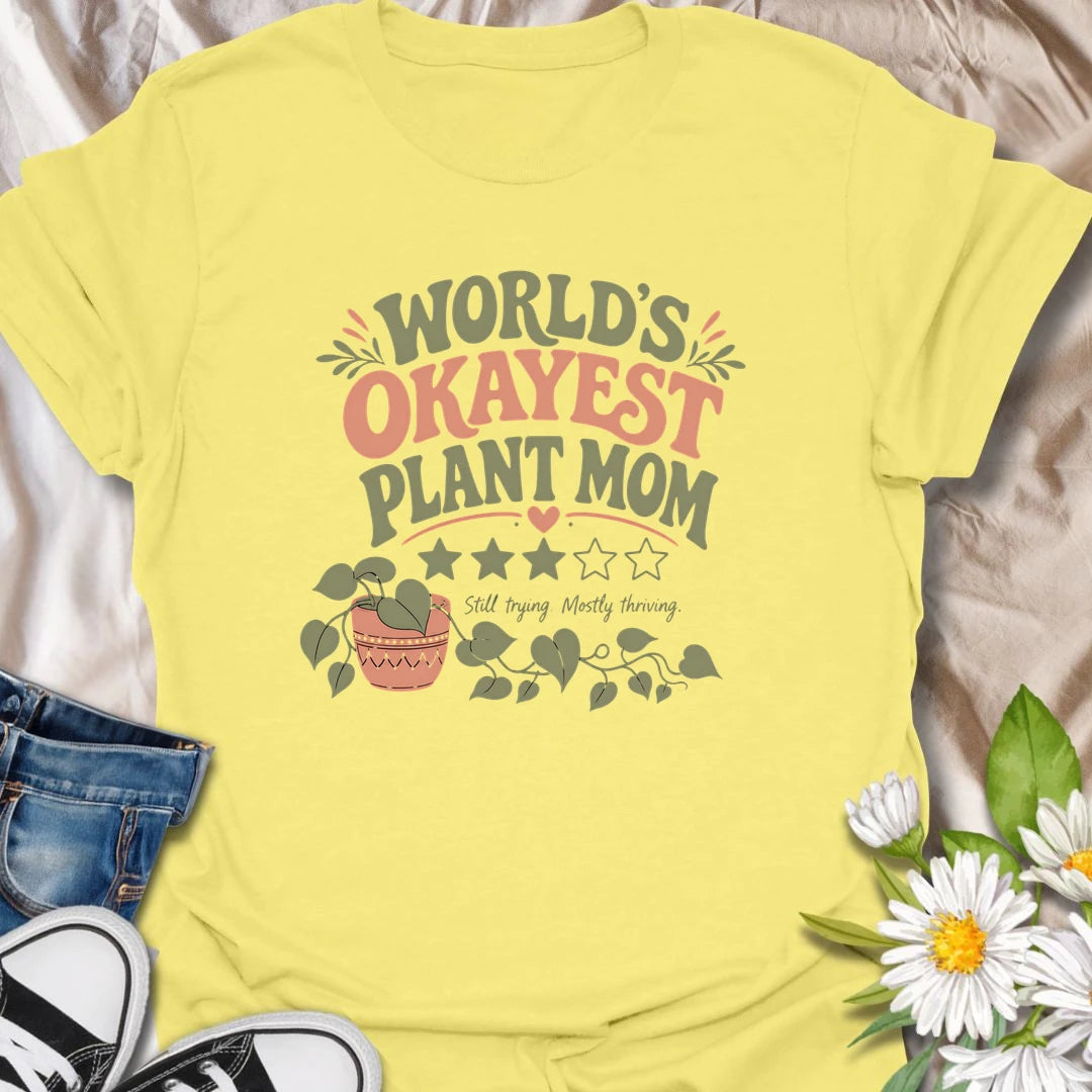 Celebrate imperfect plant parenting with this funny “World’s Okayest Plant Mom” T-shirt. Featuring a playful three-star rating, trailing houseplant, and the phrase “Still Trying, Mostly Thriving,” it is perfect for plant lovers who do their best without taking plant care too seriously. A fun gift for houseplant moms, indoor gardeners, and proudly average green thumbs.